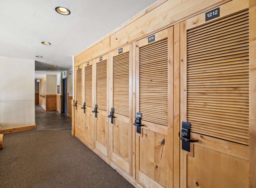 Discover the charm of this property, featuring elegant wooden lockers perfect for storing belongings.