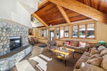 This stunning living area boasts a cozy fireplace, perfect for chilly evenings.