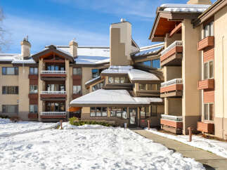 Discover the charm of Trappeur's Lodge, a stunning property nestled in a winter wonderland.