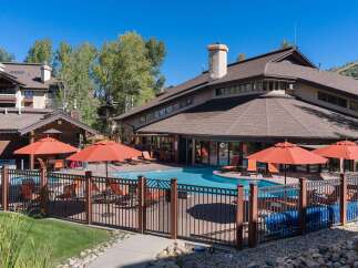 Enjoy the ultimate in luxury living with this stunning property featuring a sparkling pool and inviting outdoor spaces.