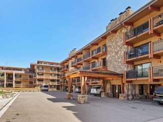 Discover the charm of this stunning property, featuring a beautiful stone facade and inviting balconies.