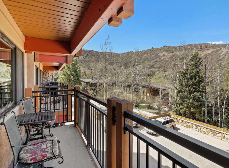 Enjoy breathtaking mountain views from this stunning balcony.