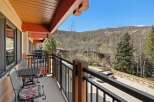 Enjoy breathtaking mountain views from this stunning balcony.