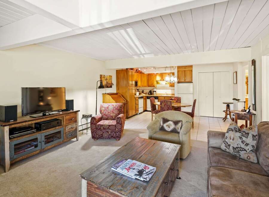 Step into this inviting living space, perfect for relaxation and entertaining.
