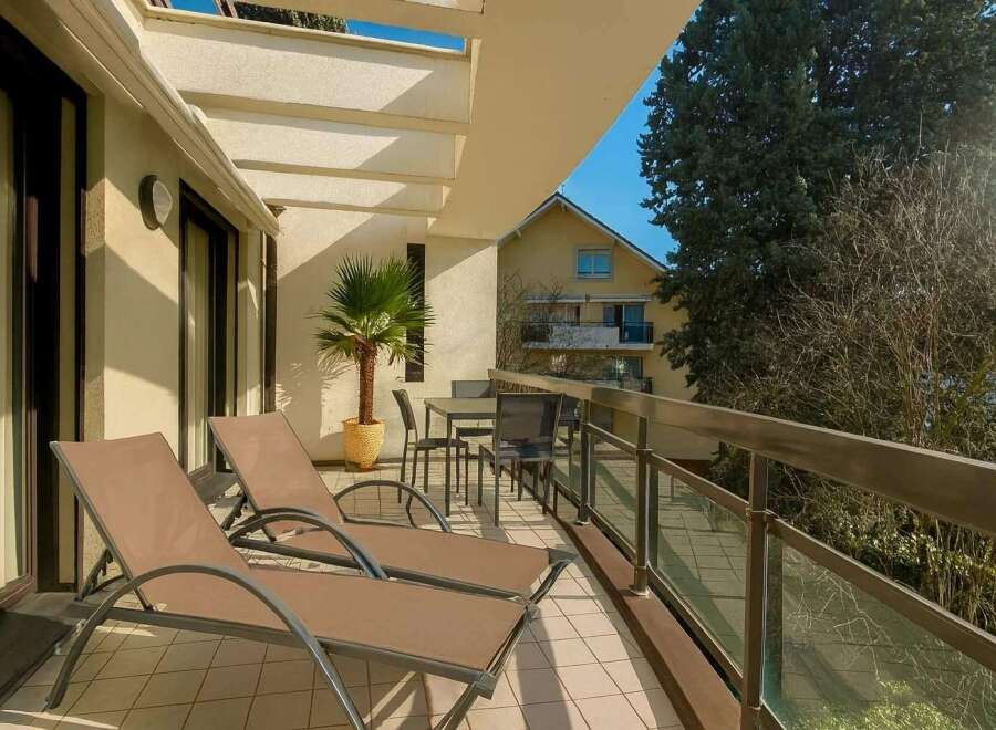 Enjoy the tranquility of this beautiful balcony, perfect for relaxing and soaking up the sun.