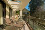 Enjoy the tranquility of this beautiful balcony, perfect for relaxing and soaking up the sun.