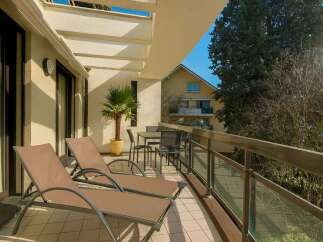 Enjoy the tranquility of this beautiful balcony, perfect for relaxing and soaking up the sun.