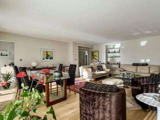 Step into luxury with this stunning property, featuring a spacious living area perfect for entertaining.