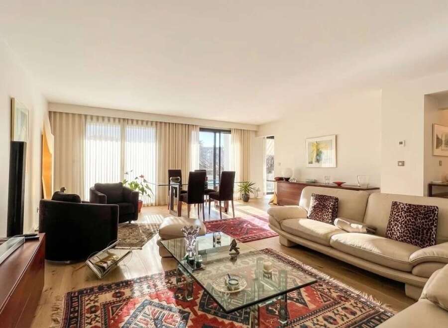Experience elegant living in this spacious apartment featuring a bright and airy living and dining area.