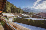 Nestled in a picturesque mountain setting, this charming property offers a serene escape.