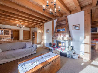 Experience the warmth and charm of this cozy living room, perfect for relaxing evenings.