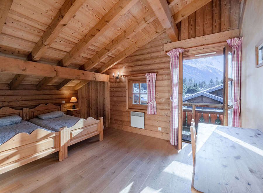Experience the charm of this cozy wooden cabin, perfect for a mountain getaway.