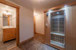 Step into relaxation with this stunning property featuring a private sauna and a well-appointed bathroom.