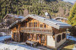 This stunning wooden chalet offers a perfect blend of rustic charm and modern comfort.