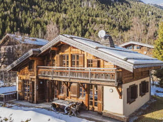 This stunning wooden chalet offers a perfect blend of rustic charm and modern comfort.