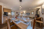 Experience the charm of this stunning property, featuring a beautifully designed dining area perfect for gatherings.