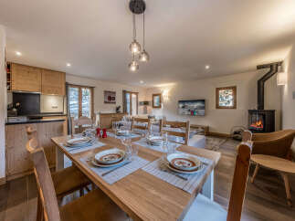 Experience the charm of this stunning property, featuring a beautifully designed dining area perfect for gatherings.