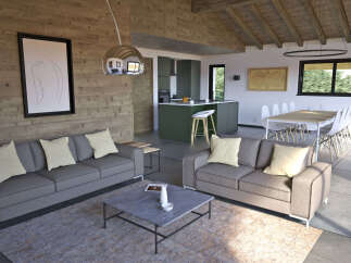 This stunning property boasts a modern open-plan living space, perfect for entertaining.