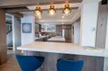 Step into this stunning kitchen, a perfect blend of modern design and rustic charm.