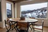 Enjoy breathtaking mountain views from this stunning dining room.