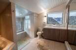 This stunning bathroom boasts a modern design with high-end finishes.