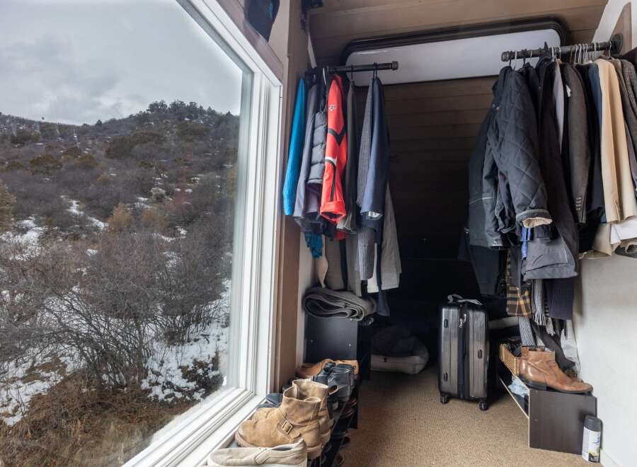 This cozy space features a well-organized closet, perfect for storing your wardrobe.