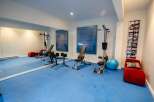 This home gym offers a dedicated space for fitness enthusiasts.