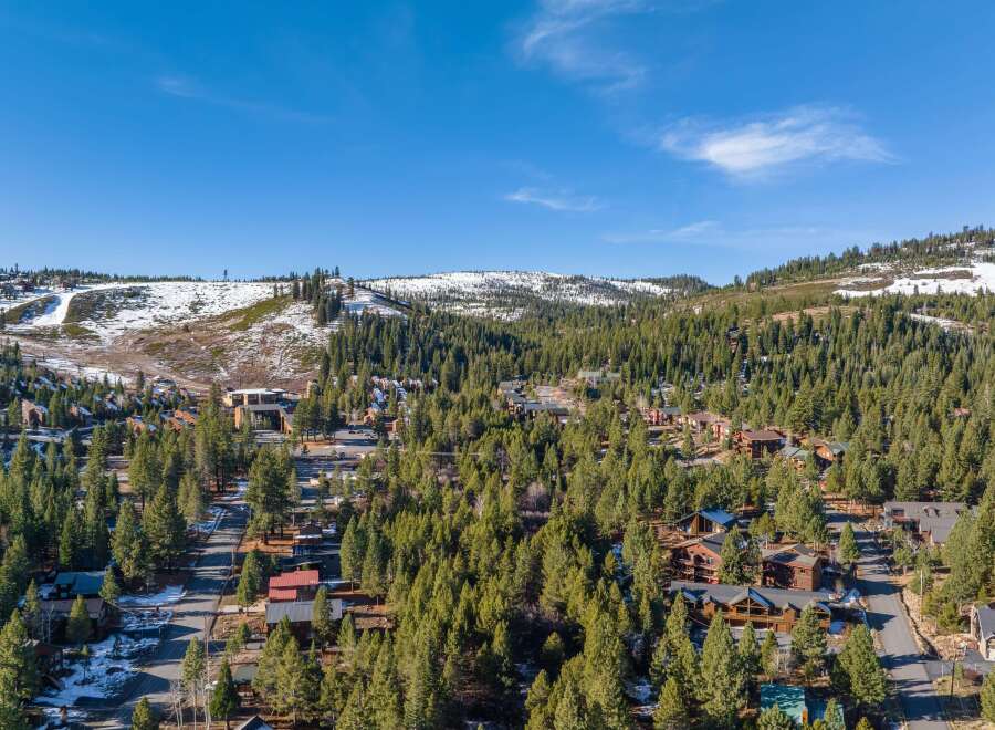 Nestled amidst a lush forest, this property offers a serene escape with stunning mountain views.