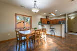 This stunning property boasts a spacious dining area, perfect for hosting gatherings.