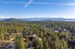 Nestled amidst a lush forest, this property offers a serene escape with stunning mountain views.