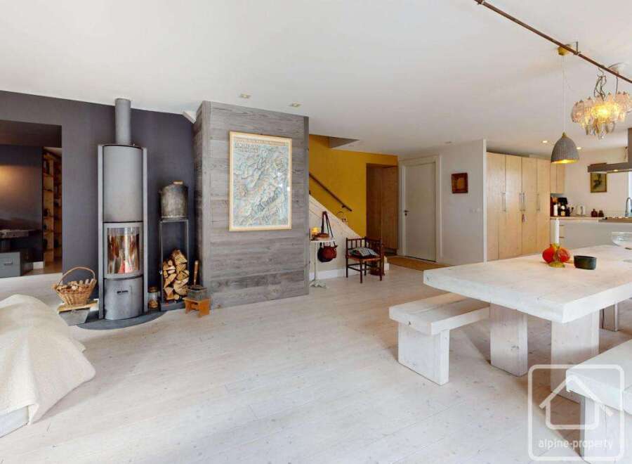Experience the charm of this stunning property, featuring a cozy fireplace and a spacious dining area perfect for gatherings.