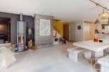 Experience the charm of this stunning property, featuring a cozy fireplace and a spacious dining area perfect for gatherings.