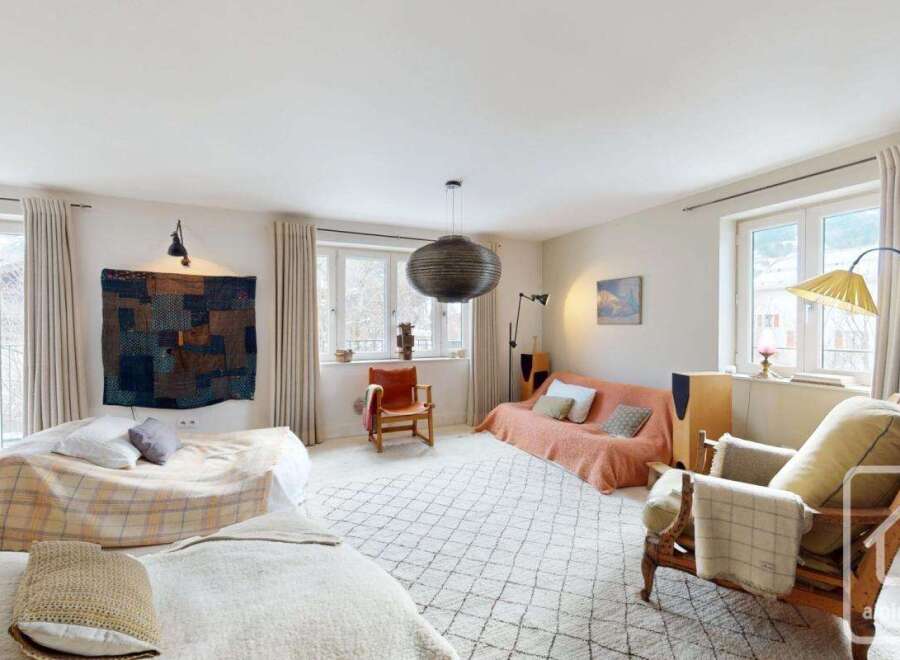 This stunning property boasts a spacious living area, perfect for relaxation and entertaining.
