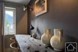 This stunning property features a beautifully designed dining area, perfect for hosting guests or enjoying family meals.