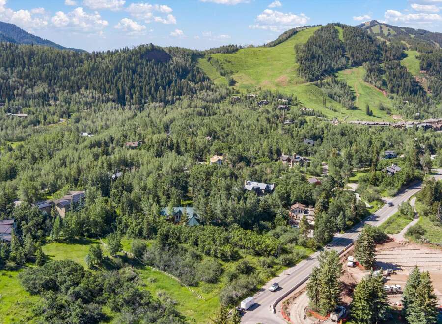 Nestled amidst the breathtaking mountain landscape, this property offers a serene escape with stunning views.