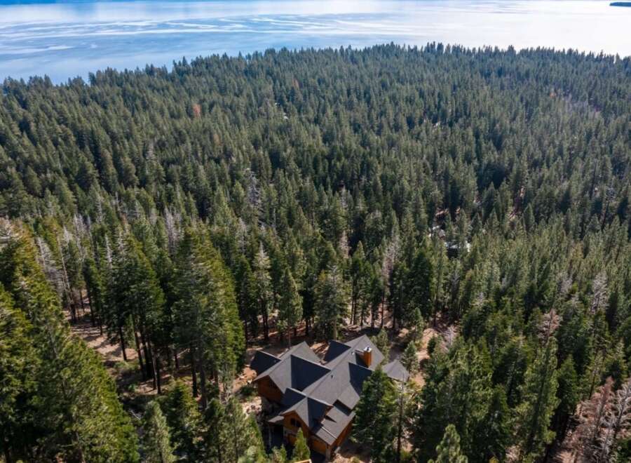 Nestled amidst a lush forest, this stunning property offers unparalleled privacy and tranquility.