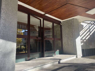 Discover the elegance of this property, featuring stunning glass doors that invite natural light.