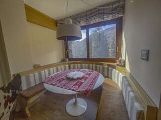 This charming dining nook offers a cozy and inviting space for enjoying meals.