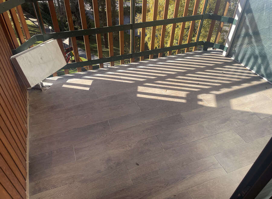 Enjoy the outdoors from this charming balcony, perfect for relaxing and taking in the views.