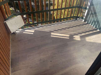 Enjoy the outdoors from this charming balcony, perfect for relaxing and taking in the views.