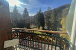 Enjoy breathtaking mountain views from this charming balcony.
