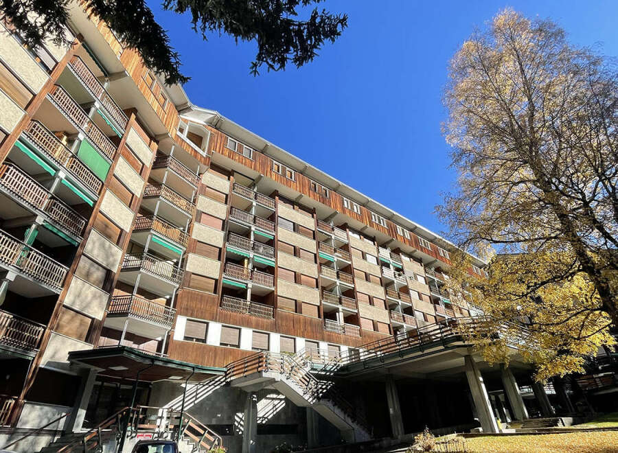 Discover the charm of this multi-story building, featuring a unique architectural design and spacious balconies.