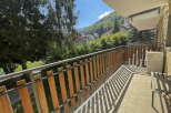 Enjoy breathtaking mountain views from this charming balcony.