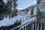 Enjoy breathtaking mountain views from this charming property.