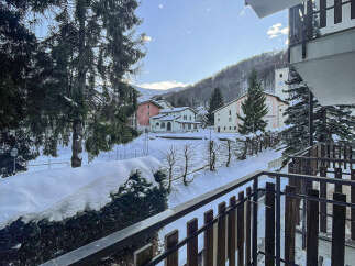 Enjoy breathtaking mountain views from this charming property.