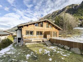 This stunning wooden chalet offers a perfect blend of rustic charm and modern comfort.