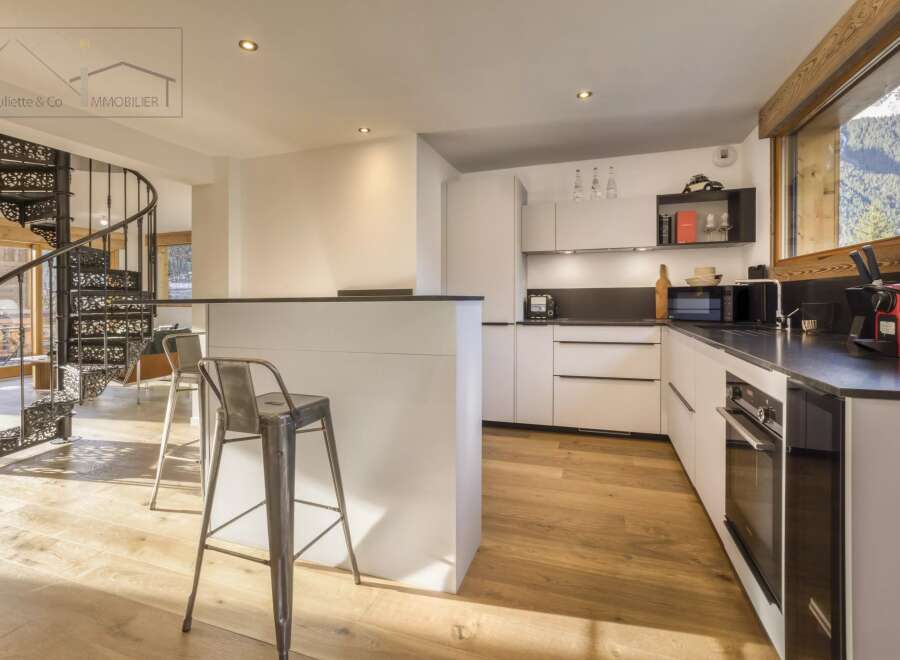 This stunning kitchen boasts modern design and functionality, perfect for culinary enthusiasts.