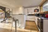 This stunning kitchen boasts modern design and functionality, perfect for culinary enthusiasts.