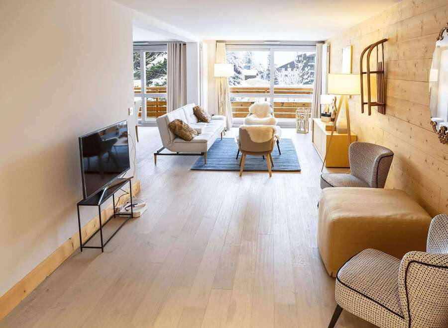 Experience luxury living in this stunning property! This home boasts a bright and airy living space with beautiful hardwood floors and large windows offering breathtaking views.