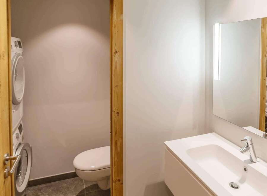 This modern bathroom features a sleek design with a bright, airy feel.